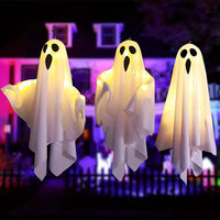 Bo ghost lights glowing on a porch after dark