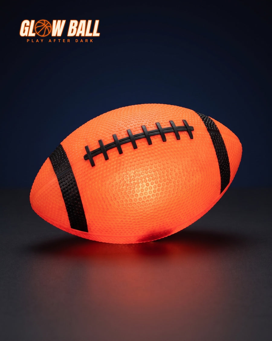 Glow Ball light-up American football glowing orange from the inside